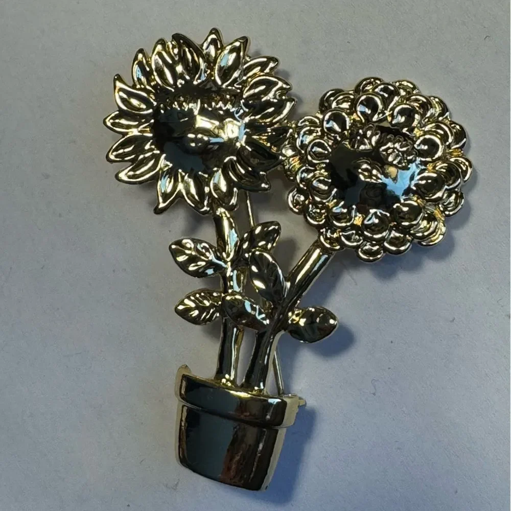 Silver tone potted flower pin brooch